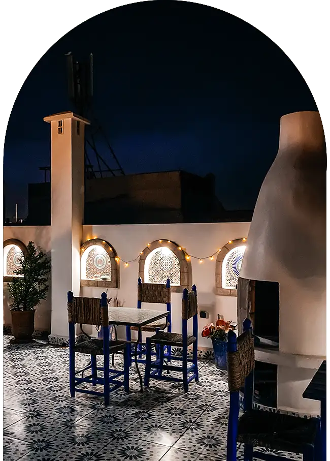Traditional Moroccan terrace illuminated at night